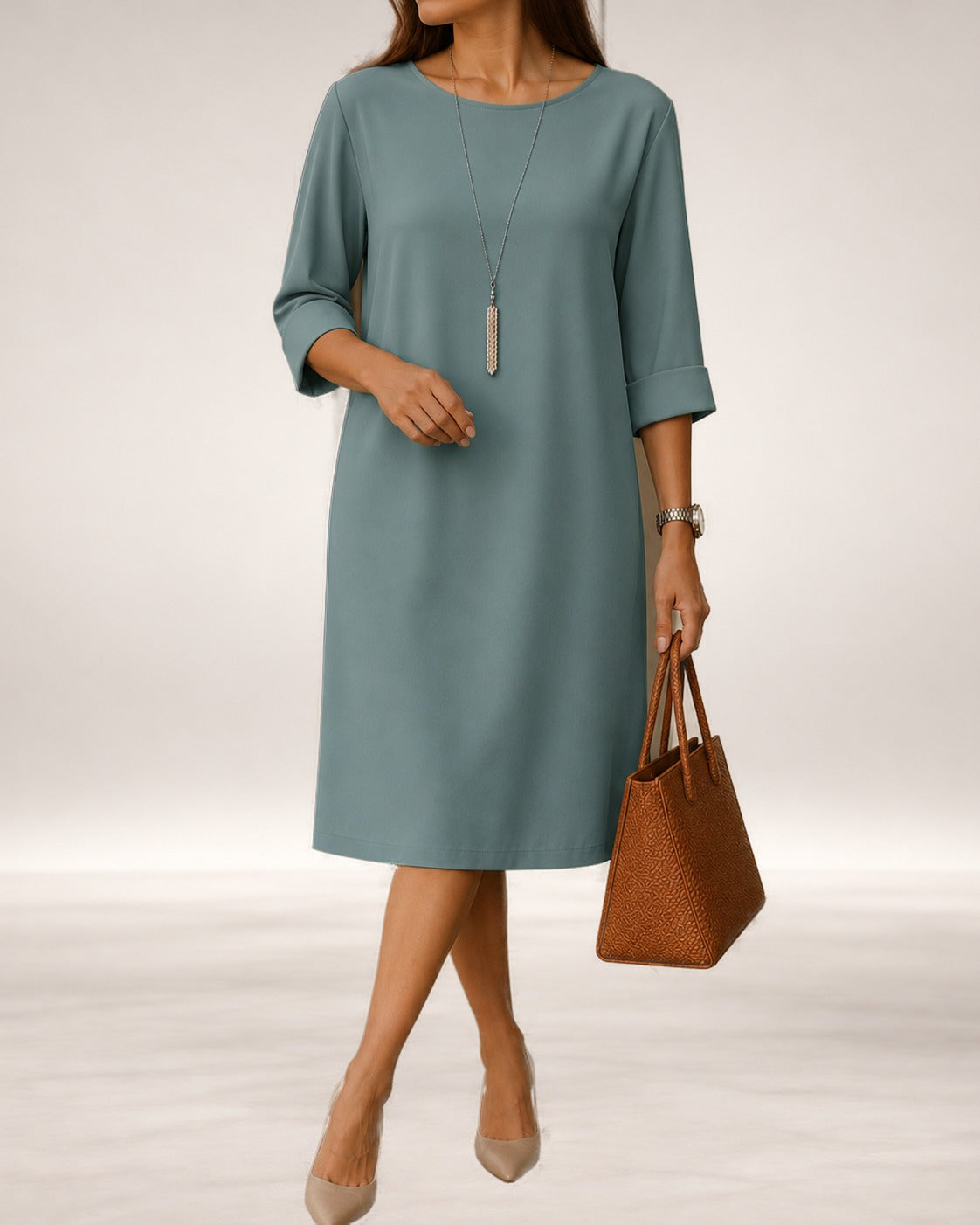 Margaret relaxed midi dress with pockets in Peacock Blue